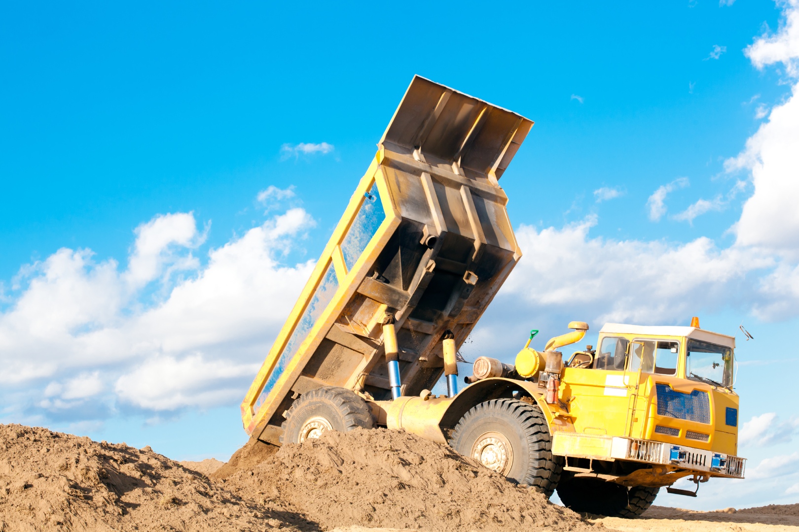 Truck emptying soil